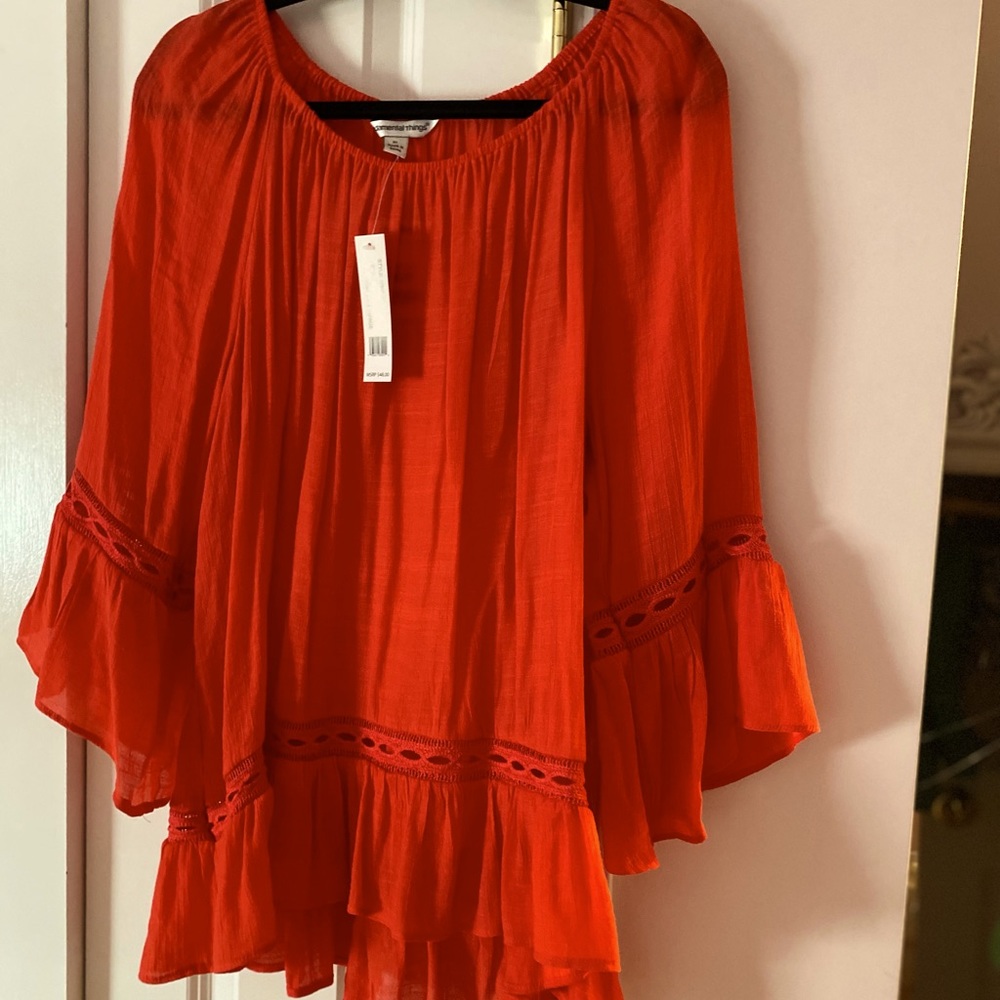 NWT orange blouse.